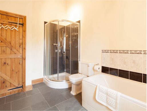 Large bathroom with shower and bath